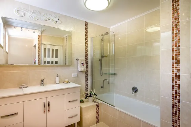 Tegelzetten badkamer vloer wand 3
