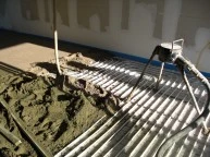 Tegelzetten vloerverwarming smeervloer